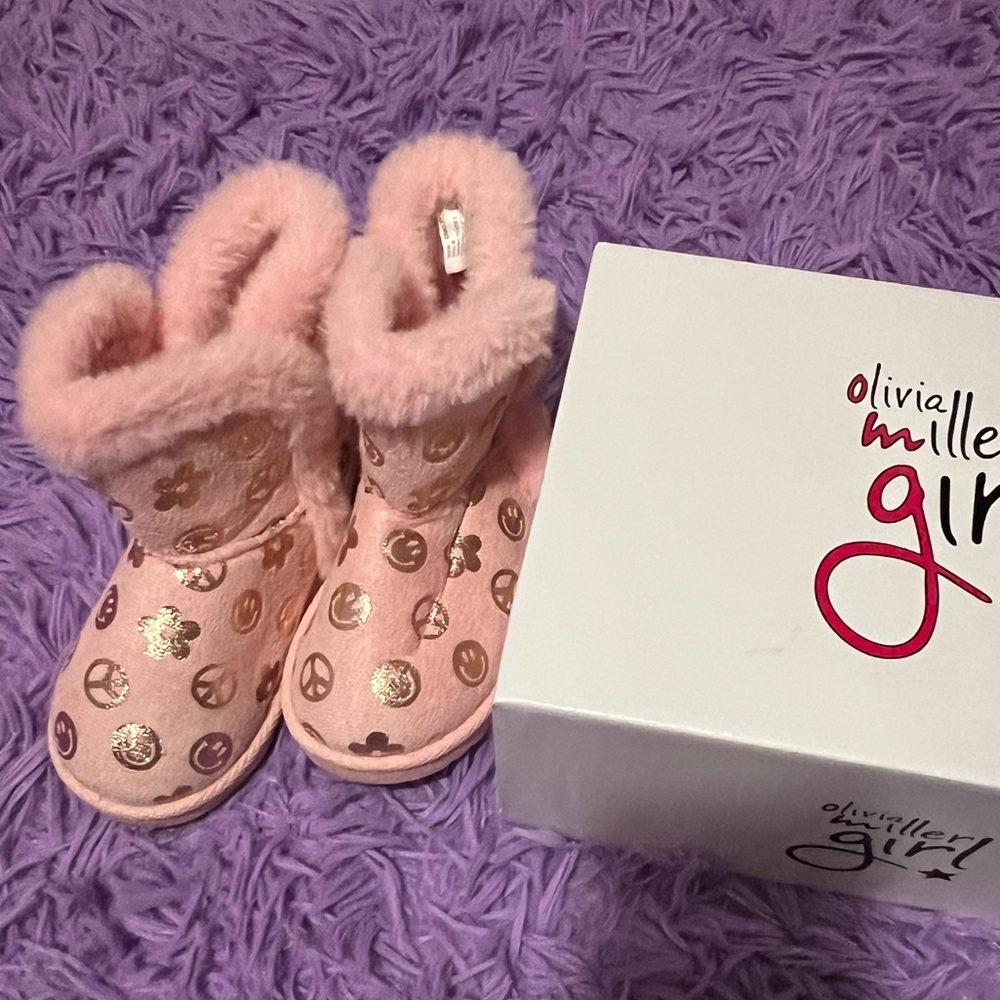 Pink Ugg style boots